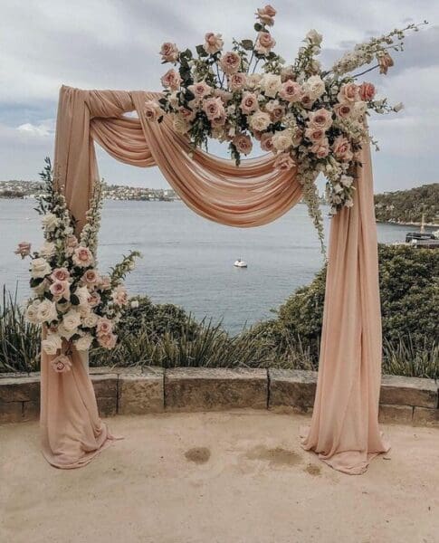 wedding-draping-cost-and-ideas-arch-dusty-rose-flowers