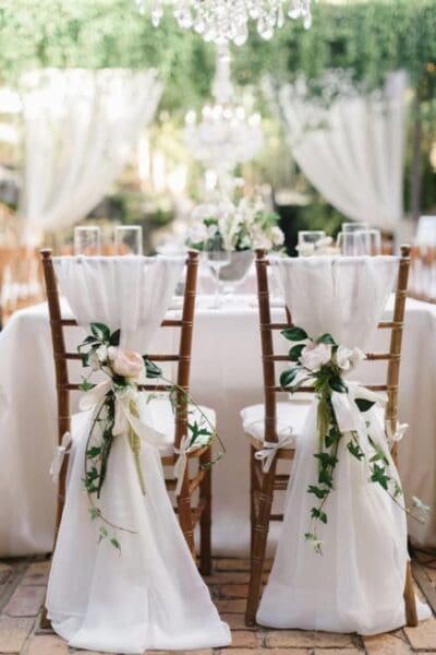 wedding-draping-cost-and-ideas-chairs-roses