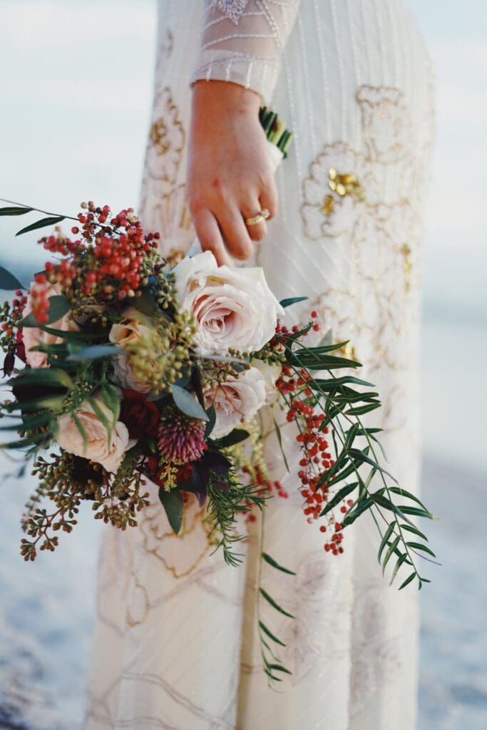 Woman Holding Bouquet of Flowers