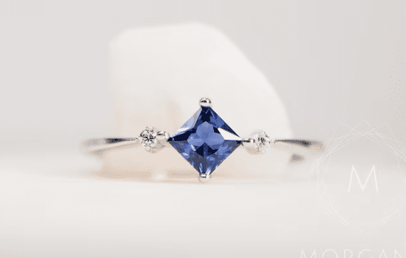 Princess-Cut-Cornflower-Blue-Sapphire-old-money-engagement-ring