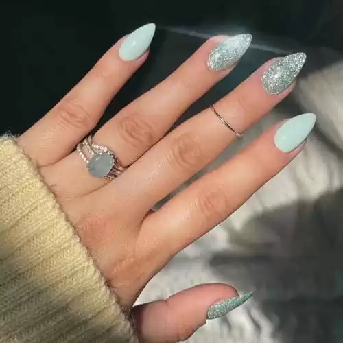 MERVF Almond Press on Nails Medium Fake Nails Mint Green Stiletto Acrylic Nails with Glitter Design Press ons Solid Color Glue on Nails 24pcs Glossy