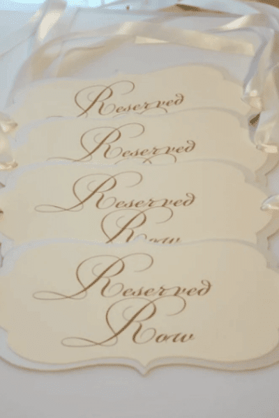 Ivory on Ivory Reserved Row Chair Signs