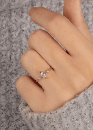 Small delicate moissanite womens engagement ring