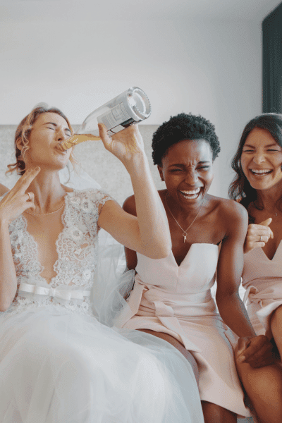 bride getting ready drinking shot list wedding photography