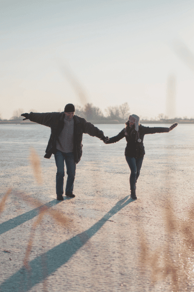 Frozen Lake Reflection winter engagement idea