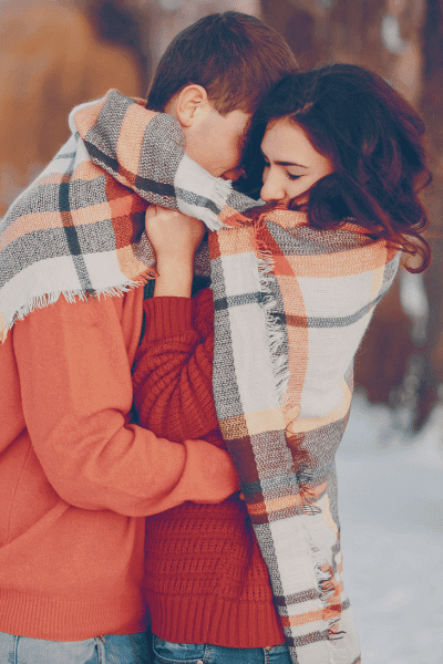 Wrapped in a Cozy Blanket winter engagement photo