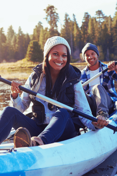 kayak on lake fall engagement photo ideas