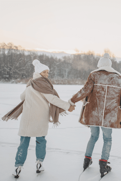 winter Ice Skating Date engagement photo shoot