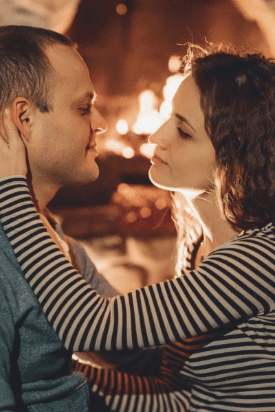 winter engagement photo shoot Fireside Snuggles