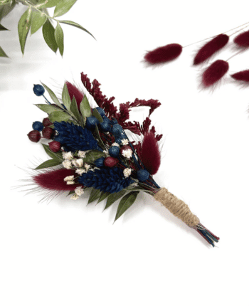 Burgundy dried flower boutonniere Via Etsy.com | $16.12+